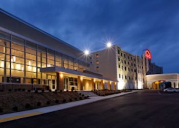 Exterior of Harlow's Hotel Resort & Spa at night 