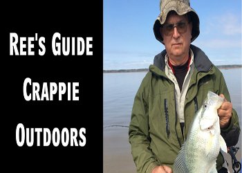 Man holding fish from Ree's Guide Outdoors