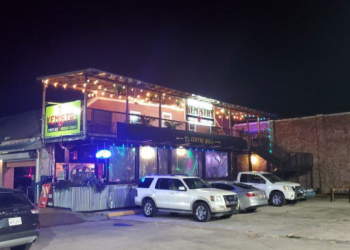 Exterior of Kemistry  Hookah Lounge in the evening