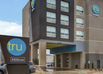Exterior of Tru by Hilton on a sunny day