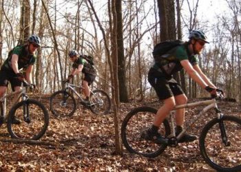 Man riding a bike on the Bayou Point Mountain Bike trail