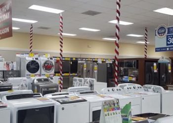 Interior of Sears, showing appliances like refrigerators and washing machines