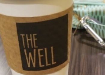 close up of the Well coffee cup